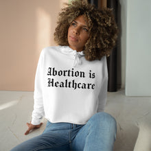 Load image into Gallery viewer, Abortion Is Heathcare Crop Hoodie