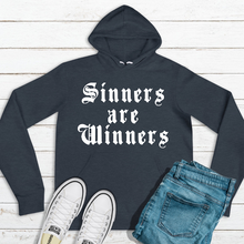 Load image into Gallery viewer, Sinners Are Winners Unisex Fleece Hoodie
